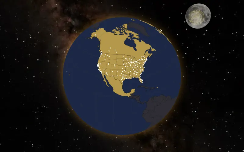 The Man Card member globe: gold countries with white pins on cities across the United States and Canada, and the moon behind.